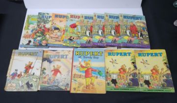 Collection of 13 Rupert annuals, mainly 1970s including a rare 1972 "Rupert at Sandy Bay" (13)