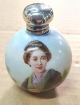 Small decorated perfume bottle with a small Birmingham 1905 silver lid