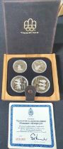 Canada 1976 Olympics sterling silver proof four coin set, cased with certificate and outer box -