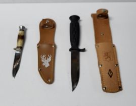 Slater of Sheffield Bowie style knife together with a Mora of Sweden knife, both with leather