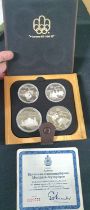 Canada 1976 Olympics sterling silver proof four coin set, cased with certificate and outer box -