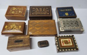 Seven good quality inlaid or carved boxes together with an old Tiddly Winks box and contents and a