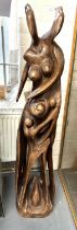 Large Wooden sculpture of a mother and father with there 2 Children and expecting, 1.5m tall