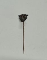 A diamond and pink sapphire leopard head tie-pin 3.8 grams gross