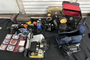 Collection of cameras and equipment including Zenit and Chinon