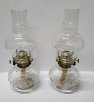 Pair of "Farms lamplight" glass Oil lamps