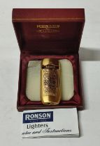 Vintage engraved Ronson lighter in case