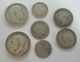 Seven worn/circulated Georgian and Queen Victorian silver coins (7) Approx 40.5 grams