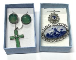 Silver and blue delft pendant on chain and broach along with SIlver Jade cross on chain with earings