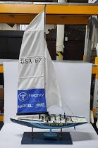 Large "USA 67 ONE WORLD" model racing yacht on stand, measuring 100cm high