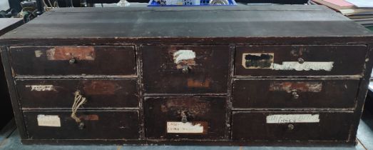 A set of slender pigeon hole drawers