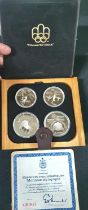 Canada 1976 Olympics sterling silver proof four coin set, cased with certificate and outer box,