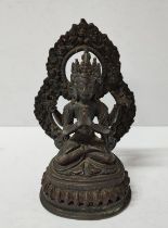 A bronze deity figure 16cm high