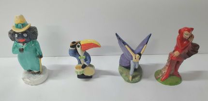 Four small various Carlton Ware figurines including the Guinness Toucan and the Devil etc (4).