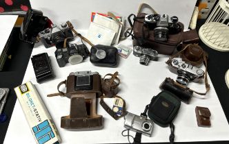 Good collection of cameras including Olympus and Minolta and Praktica etc