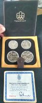 Canada 1976 Olympics sterling silver proof four coin set, cased with certificate and outer box -