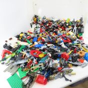 Bin full of Legos and Bionicles