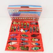 GI Joe action figures in collector case