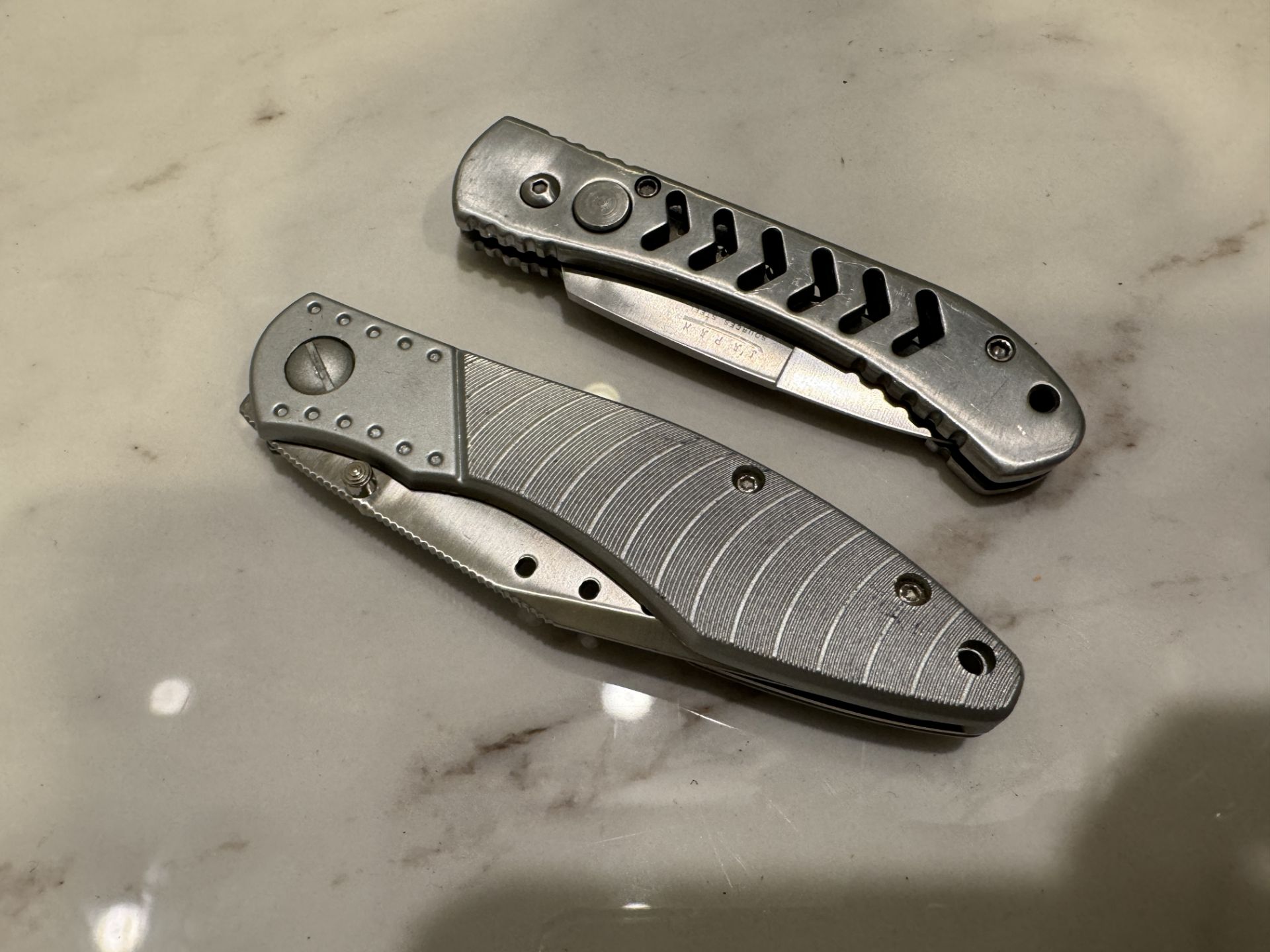 2 POCKET KNIVES, ONE IS SPRING LOADED