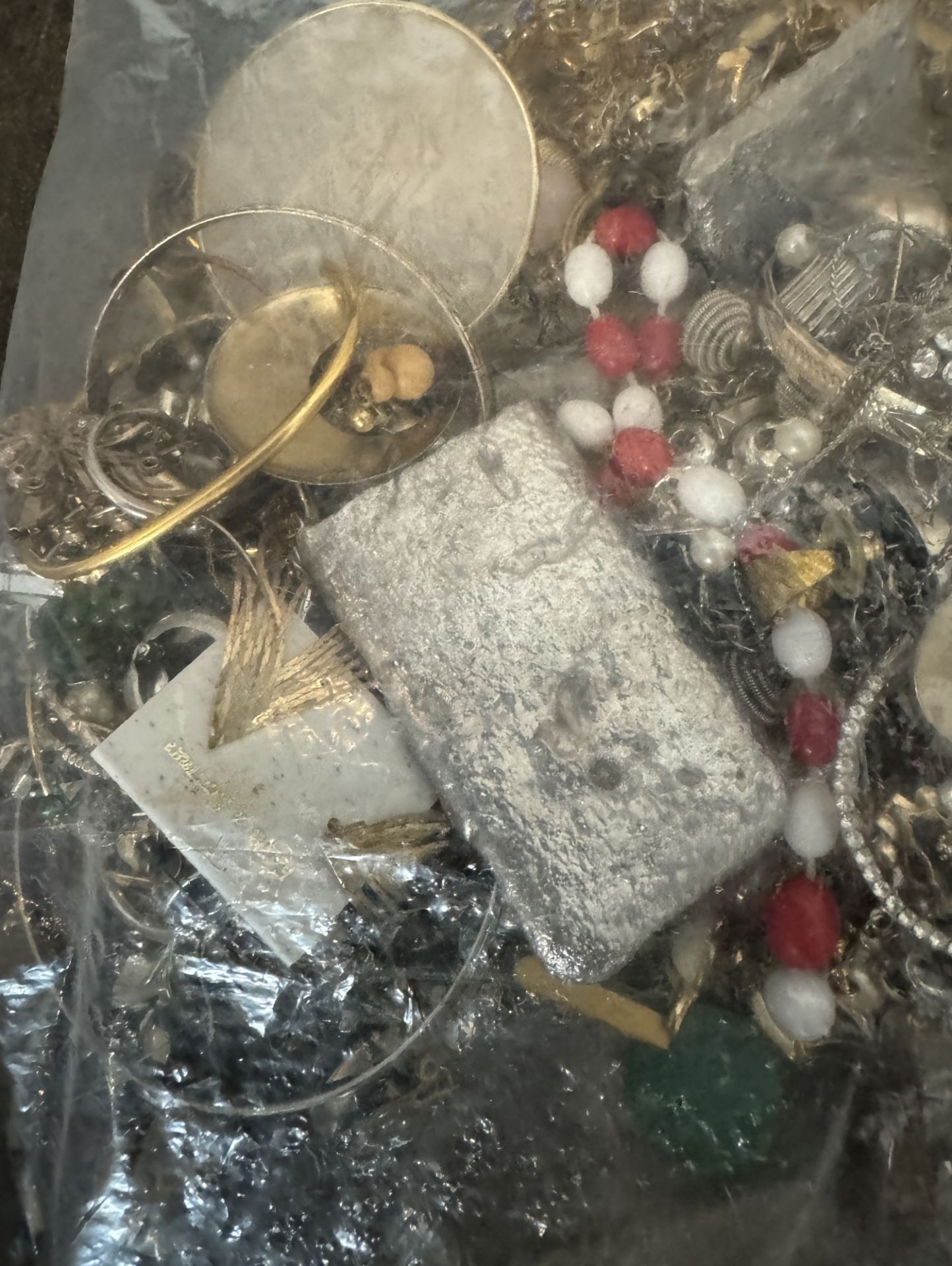 BAG OF MIXED UNSORTED JEWELRY / SOME SORT OF SILER BRICK INSIDE IT - Image 3 of 4