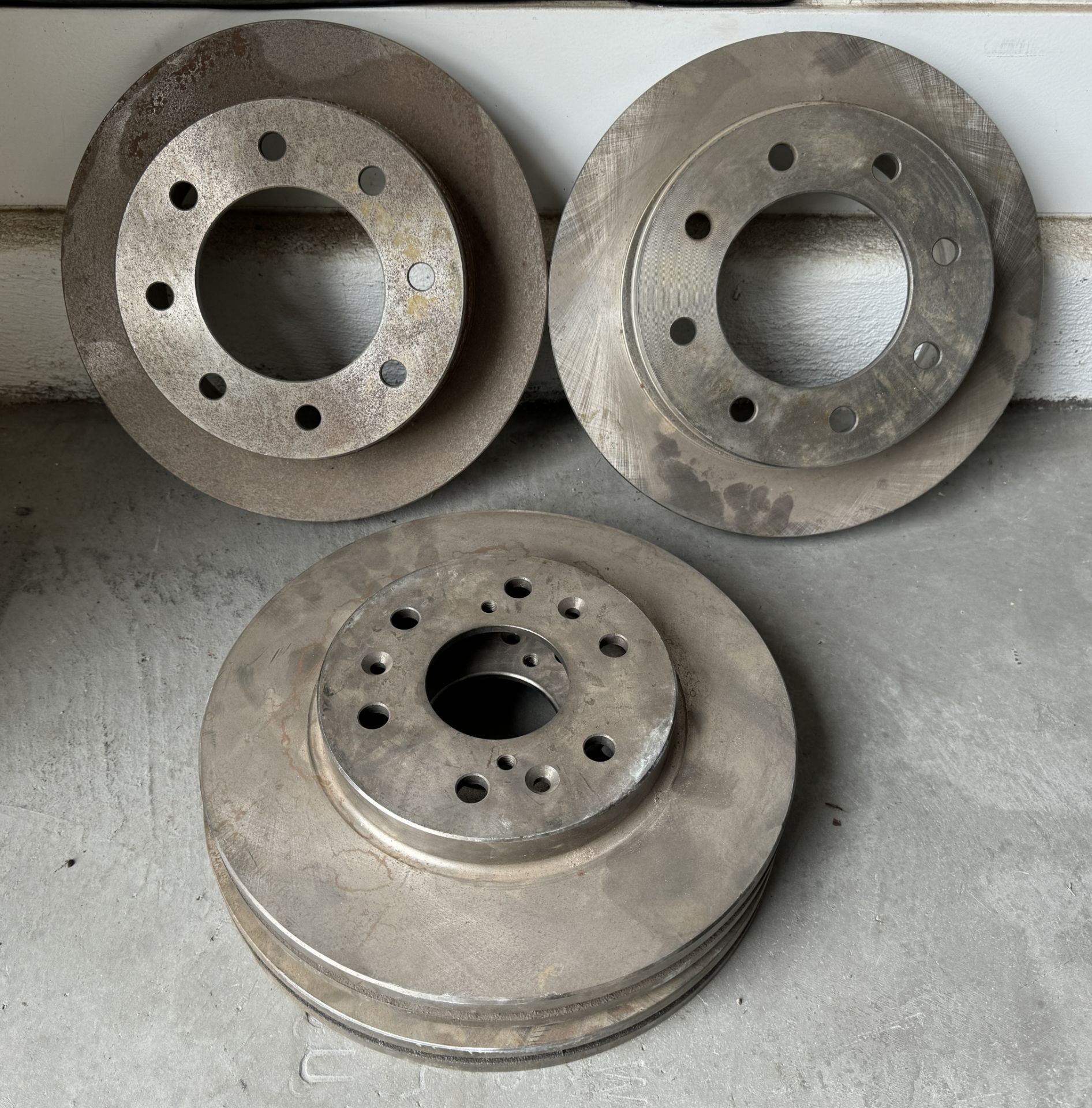 4 ROTORS & BRAKE PADS, " PROBABLY FOR FORD F150 - F350