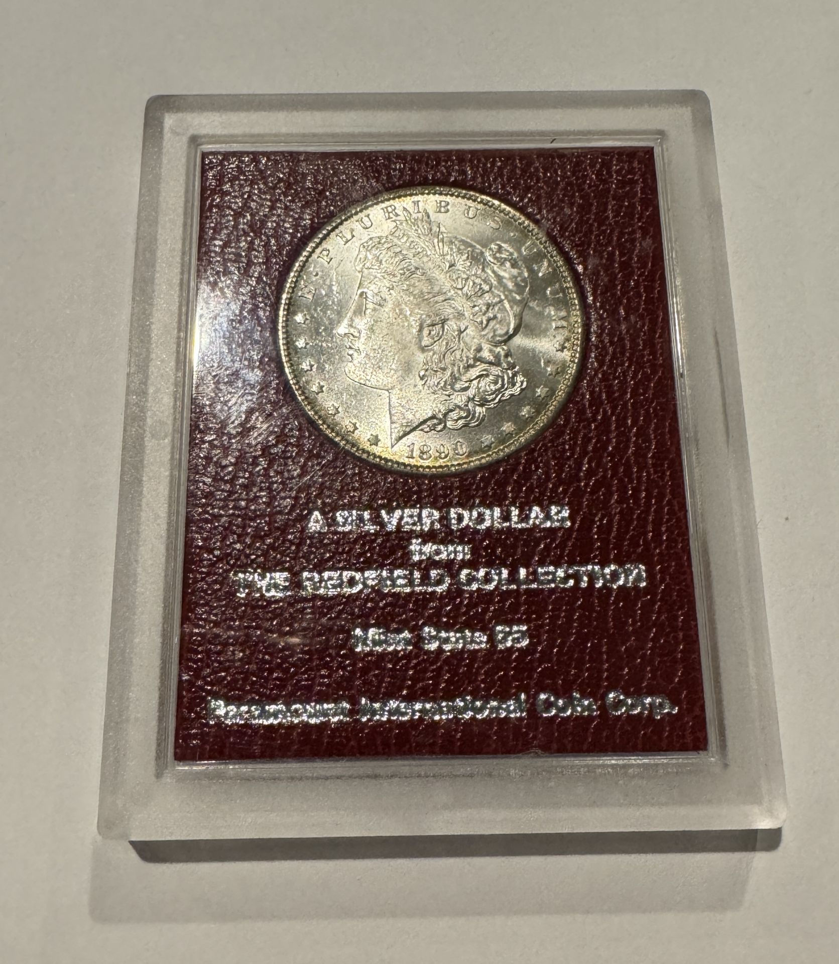 THE REDFIELD COLLECTION 1890 SILVER DOLLAR MS65