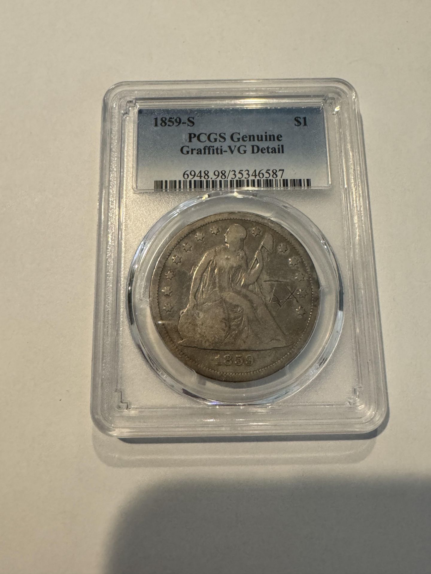 1859-S $1 PCGS GENUINE GRAFFITI-VG DETAIL