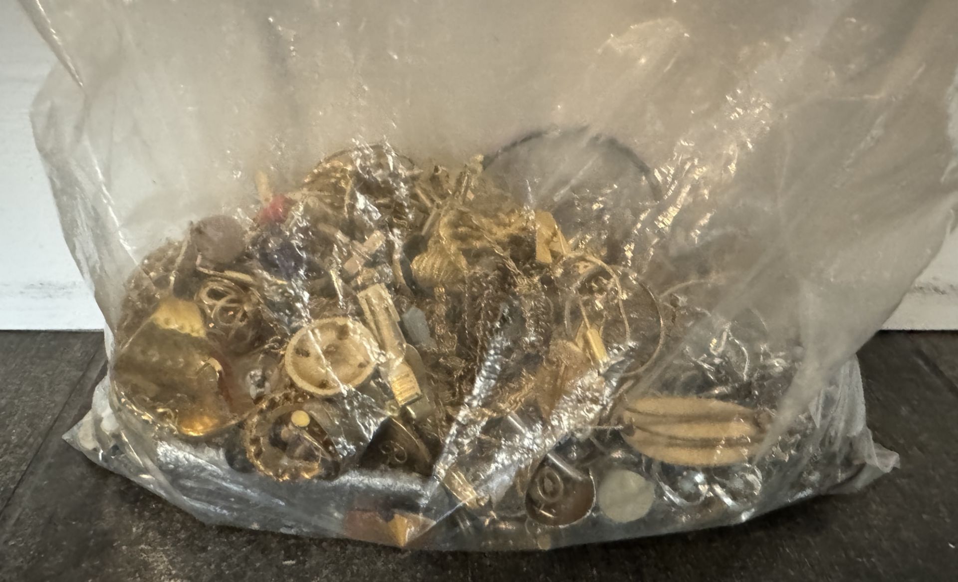 BAG OF MIXED UNSORTED JEWELRY / SOME SORT OF SILER BRICK INSIDE IT - Image 2 of 4