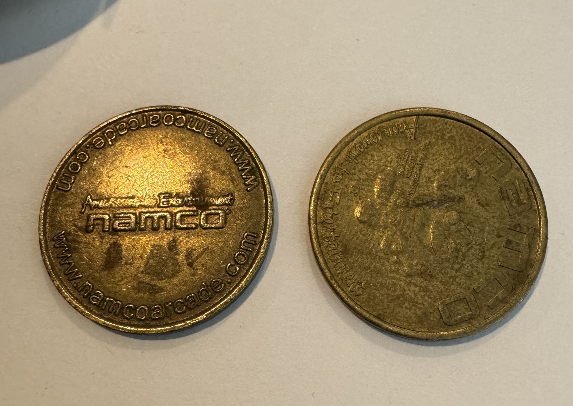 NAMCO GAME TOKENS + TOKEN ON PORTABLE MEASURING TAPE - Image 2 of 2