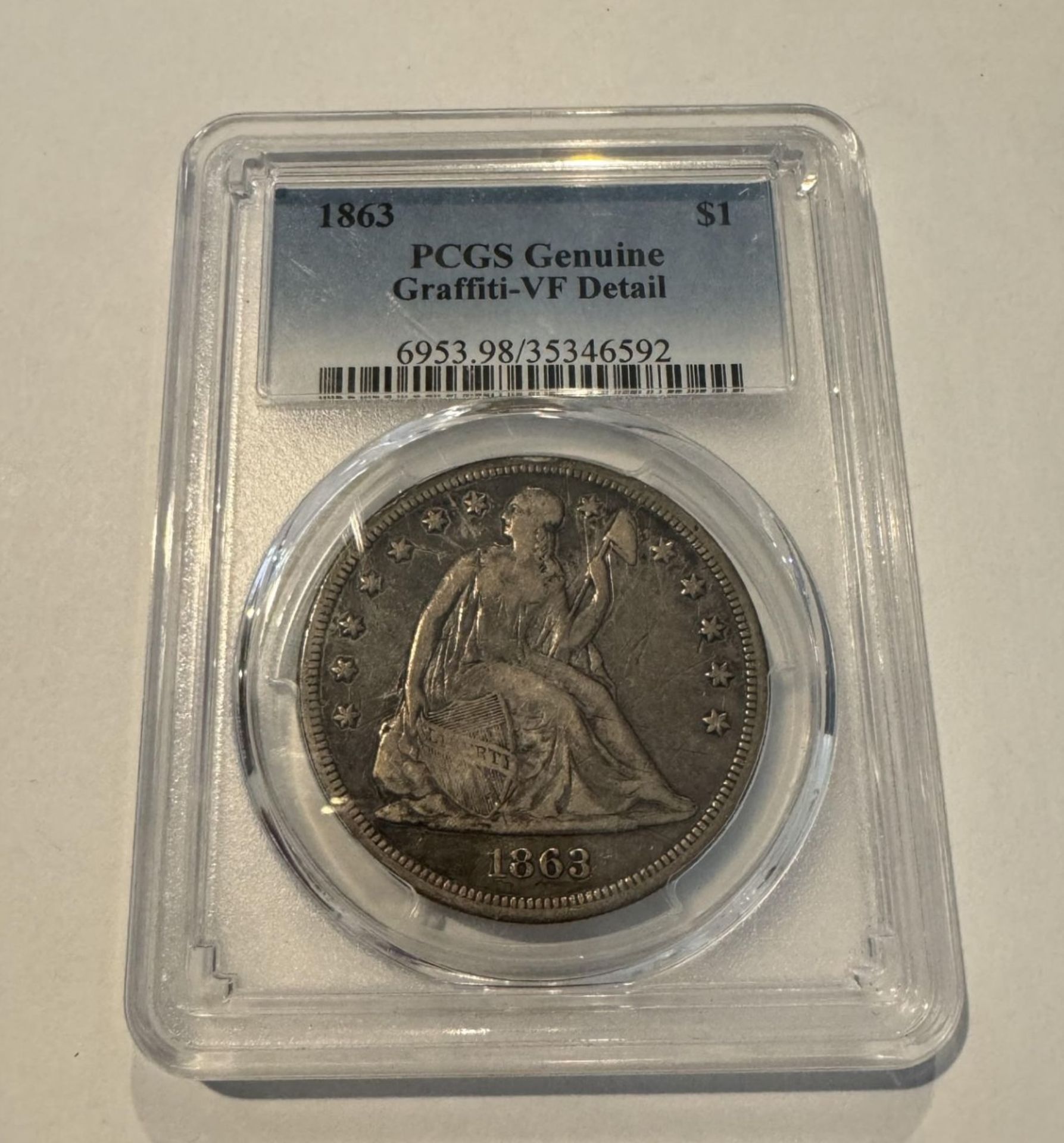 1863 $1 PCGS GENUINE GRAFFITI-VF DETAIL