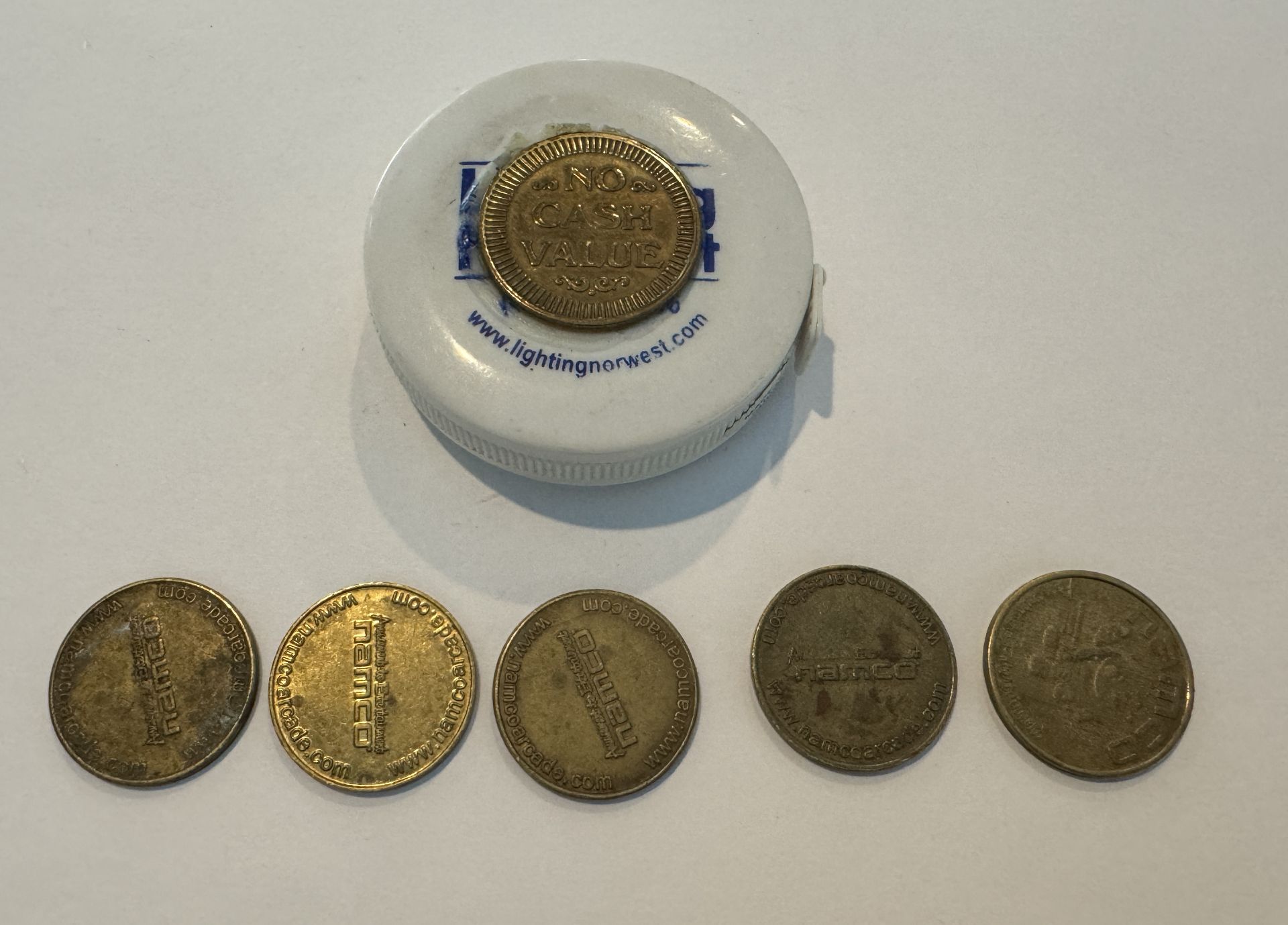 NAMCO GAME TOKENS + TOKEN ON PORTABLE MEASURING TAPE