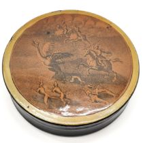 Antique papier-mâché circular snuff box depicting an emu being hunted to the lid 9cm diameter,