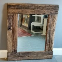 Driftwood bevelled edged framed mirror measuring 100cm wide x 120cm high. In good condition.