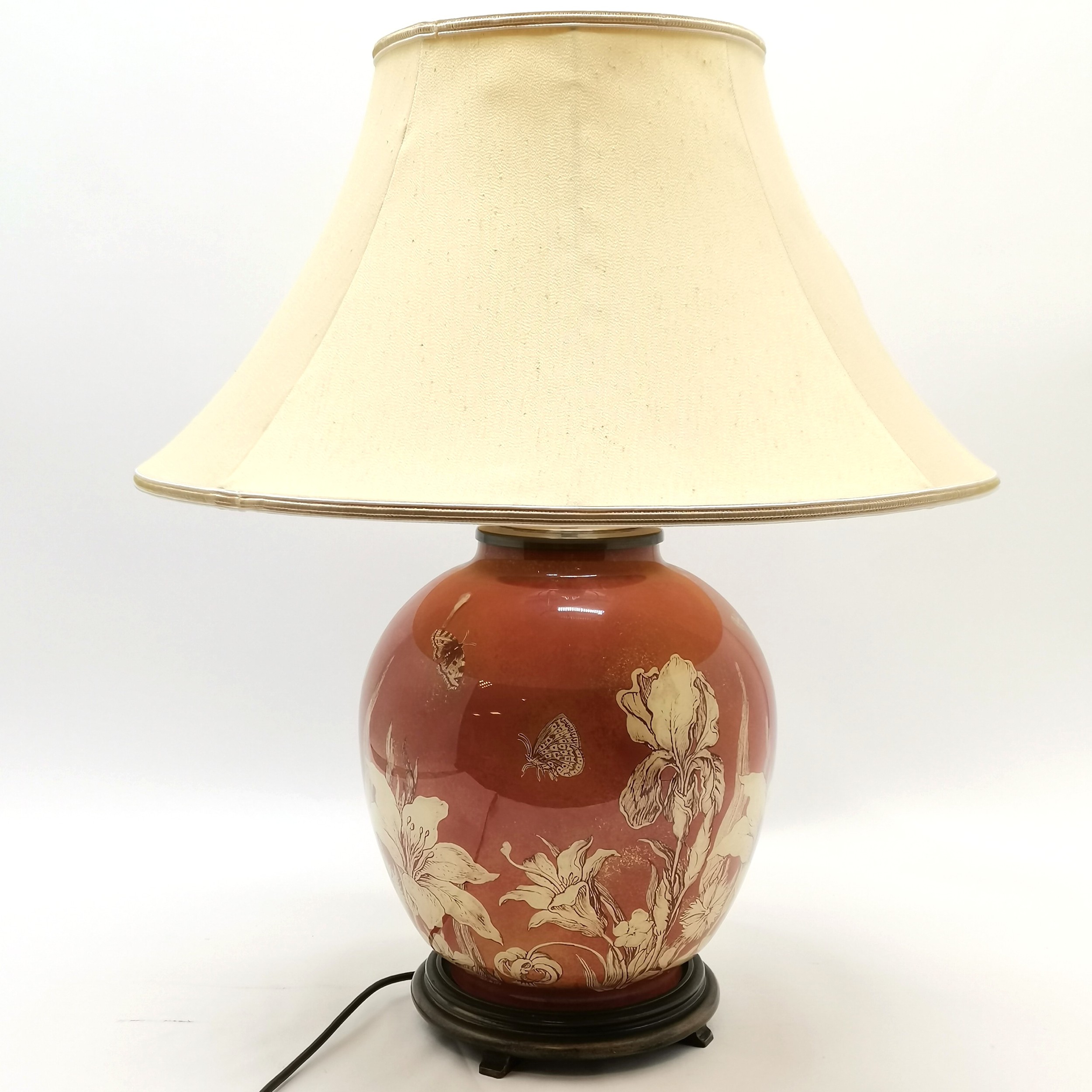 Contemporary floral decorated rust ground lamp complete with shade, lamp base, 44 cm high, good used