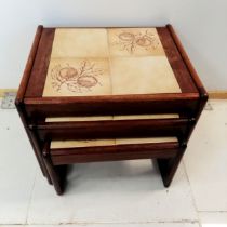 Mid Century Teak Nest of 3 tables with tiled tops decorated with horse chestnuts, largest 55 cm