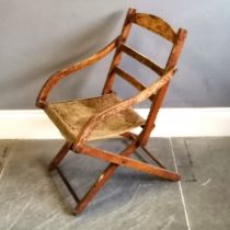 Antique folding campaign chair with carpet seat, needing attention, in original condition, 47 cm