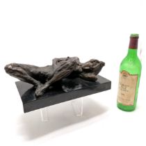 Contemporary bronze figure of a nude lady reclining signed Dolov on a marble base (30cm x 16cm)