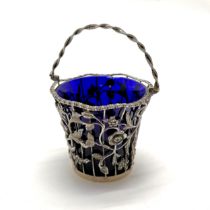 1902 silver pierced basket sugar basin with swing handle & blue glass liner by William Comyns - body