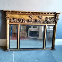 Classical decorated gilt framed over mantle mirror, 128 cm wide, 93 cm high.