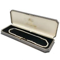 44cm strand of cultured pearls (approx 5mm diameter) with 9ct gold clasp in a retail box