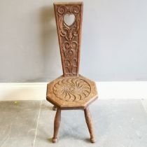 Antique carved oak high backed spinning chair with heart detail measuring 36cm x 38cm x 89cm. Used