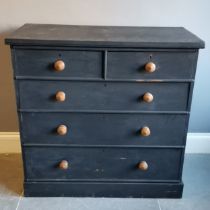 Black Painted Chest of 2 short and 3 long graduated drawers on platform base, with turned wooden