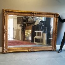 Very large heavy gilt framed bevelled edge mirror. Measuring 160cm wide x 220cm high. Overall good