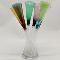 Set of 6 coloured glass flutes 32cm long in a glass container- no obvious damage