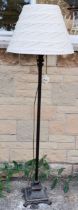 A Contemporary classical inspired floor lamp, 24 cm diameter base, 164 cm high to include shade.