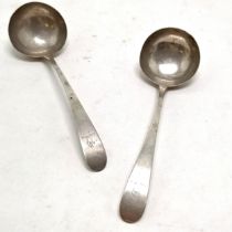 2 x 1801 Dublin silver ladles by Samuel Neville with crests - 19cm & 82g - 1 has rubbed marks and