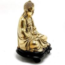 Antique polished bronze seated Buddha on original hand carved wooden base with yin / yang detail -