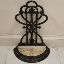 Antique cast iron umbrella stand with makers mark to reverse, complete with drip tray, (has a crack)