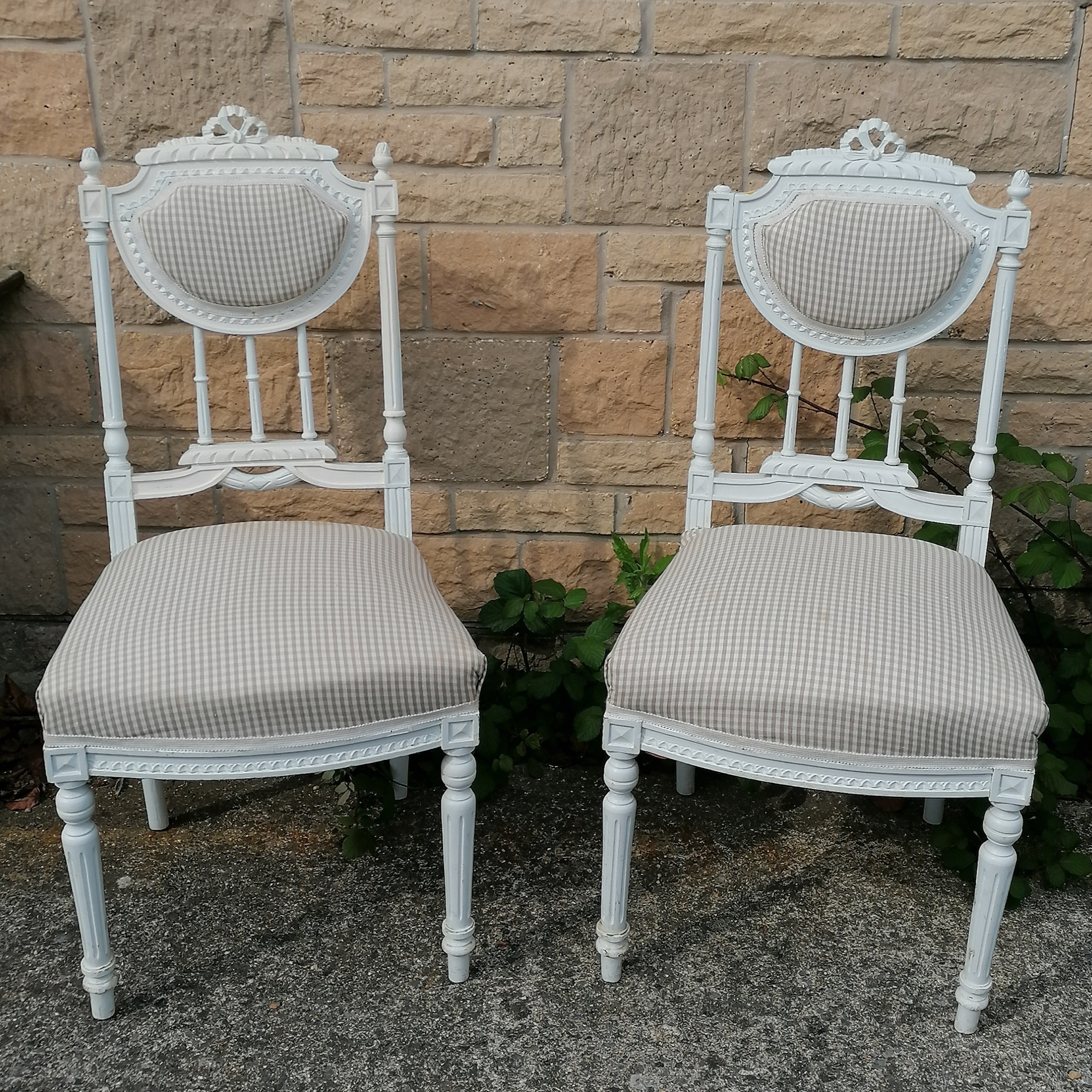 Pair of white painted bedroom chairs with check fabric upholstery