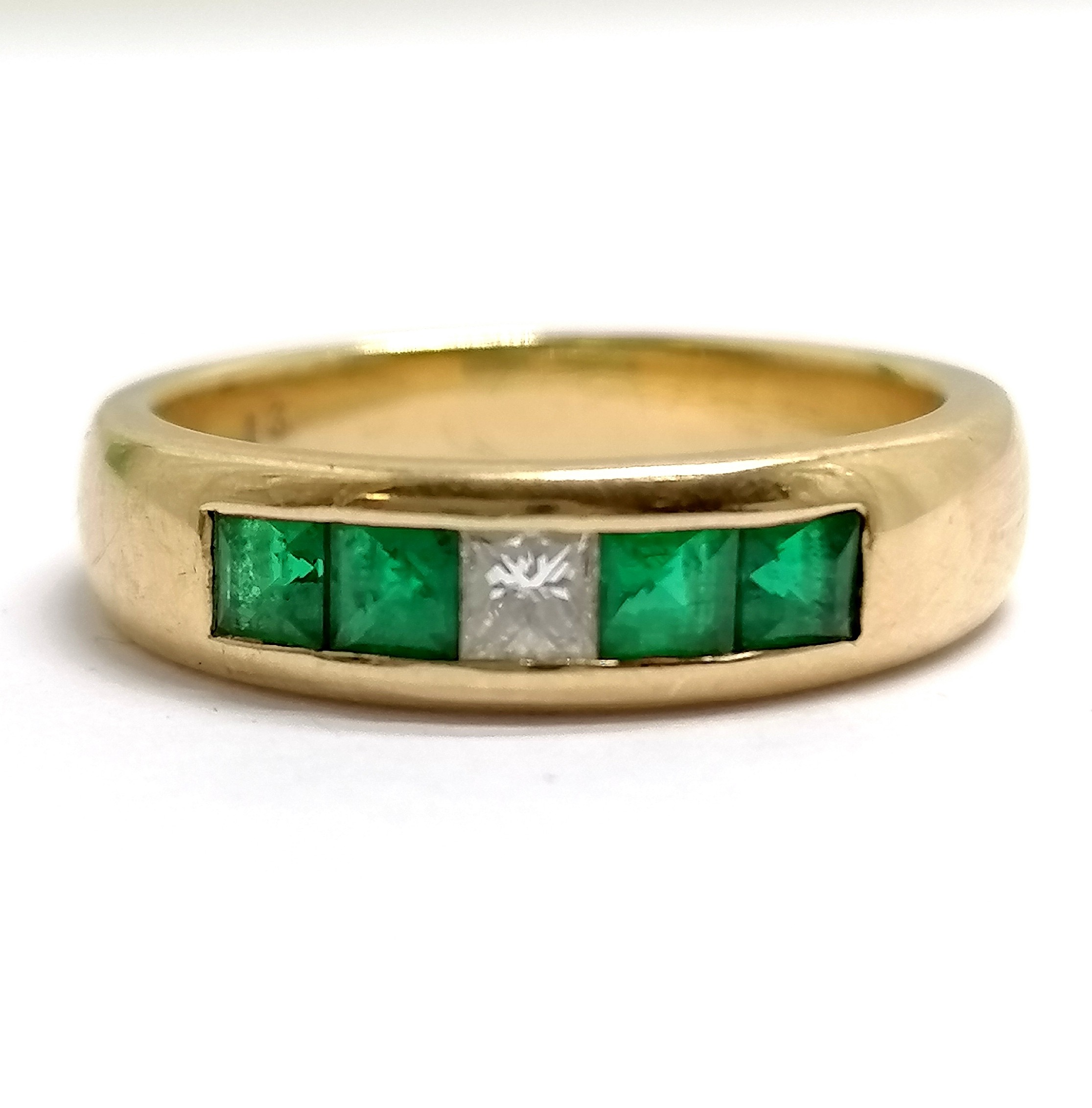 18ct marked gold emerald (0.5 cts) & diamond (0.13 ct) set band ring - size P & 6.6g total weight